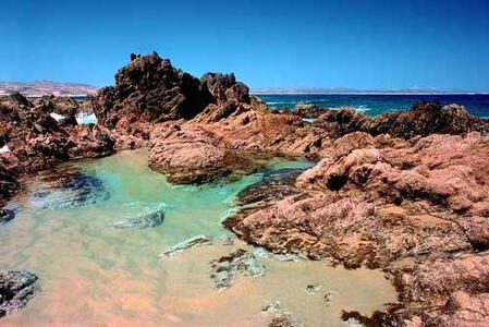 Example of a home carved in a rock. Credit to artist